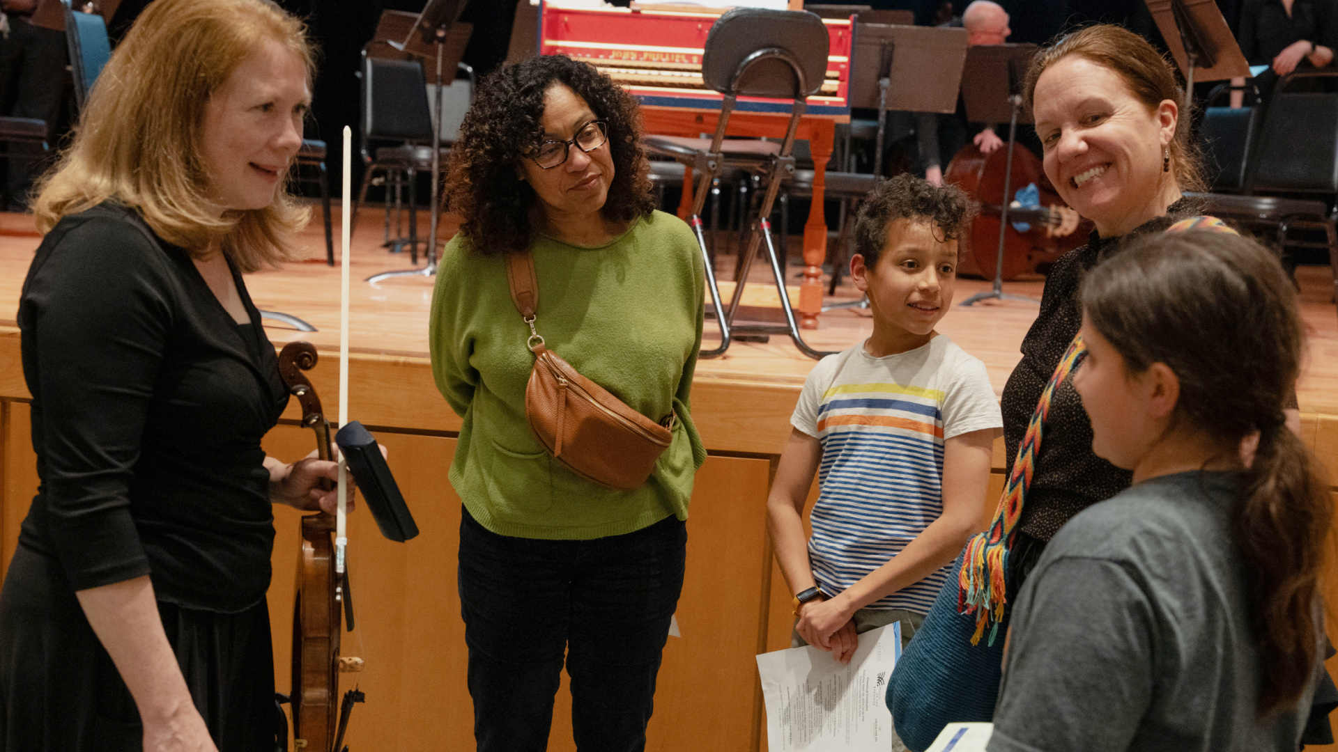 Katie Brauer chats with two young people